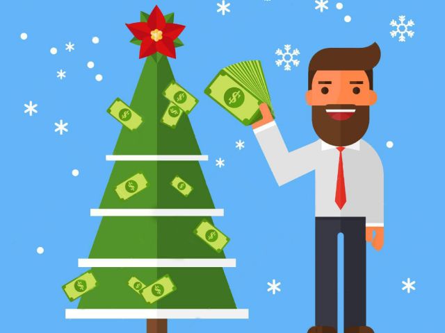 Businessman decorates a Christmas tree with money